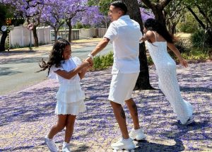 Family man: Kaizer Chiefs star with two daughters and wife