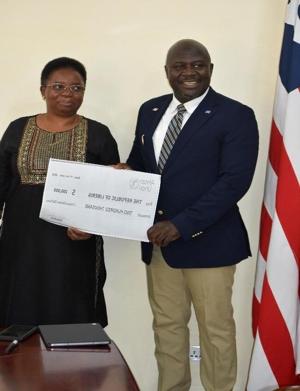 AU Presents US0K for Flood Victims