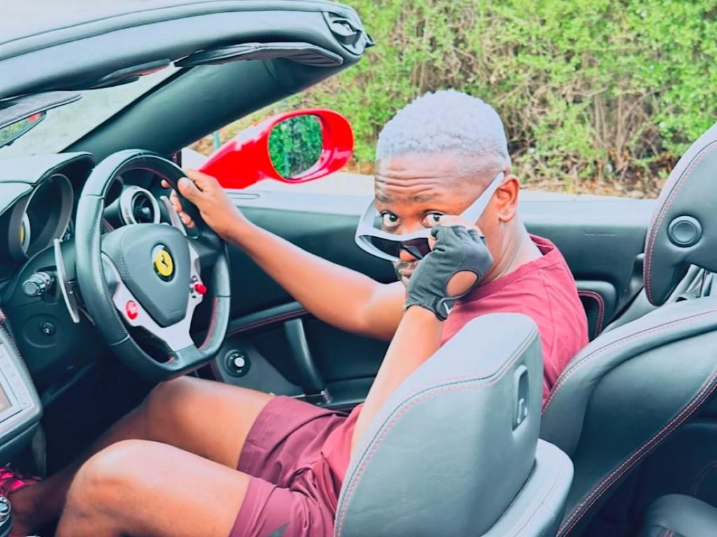 PICTURES: Clement Maosa flexes sleek Ferrari